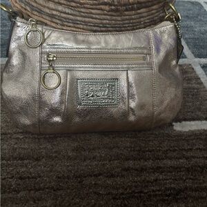 Coach Gold Shoulder Bag with Shimmering Elegance